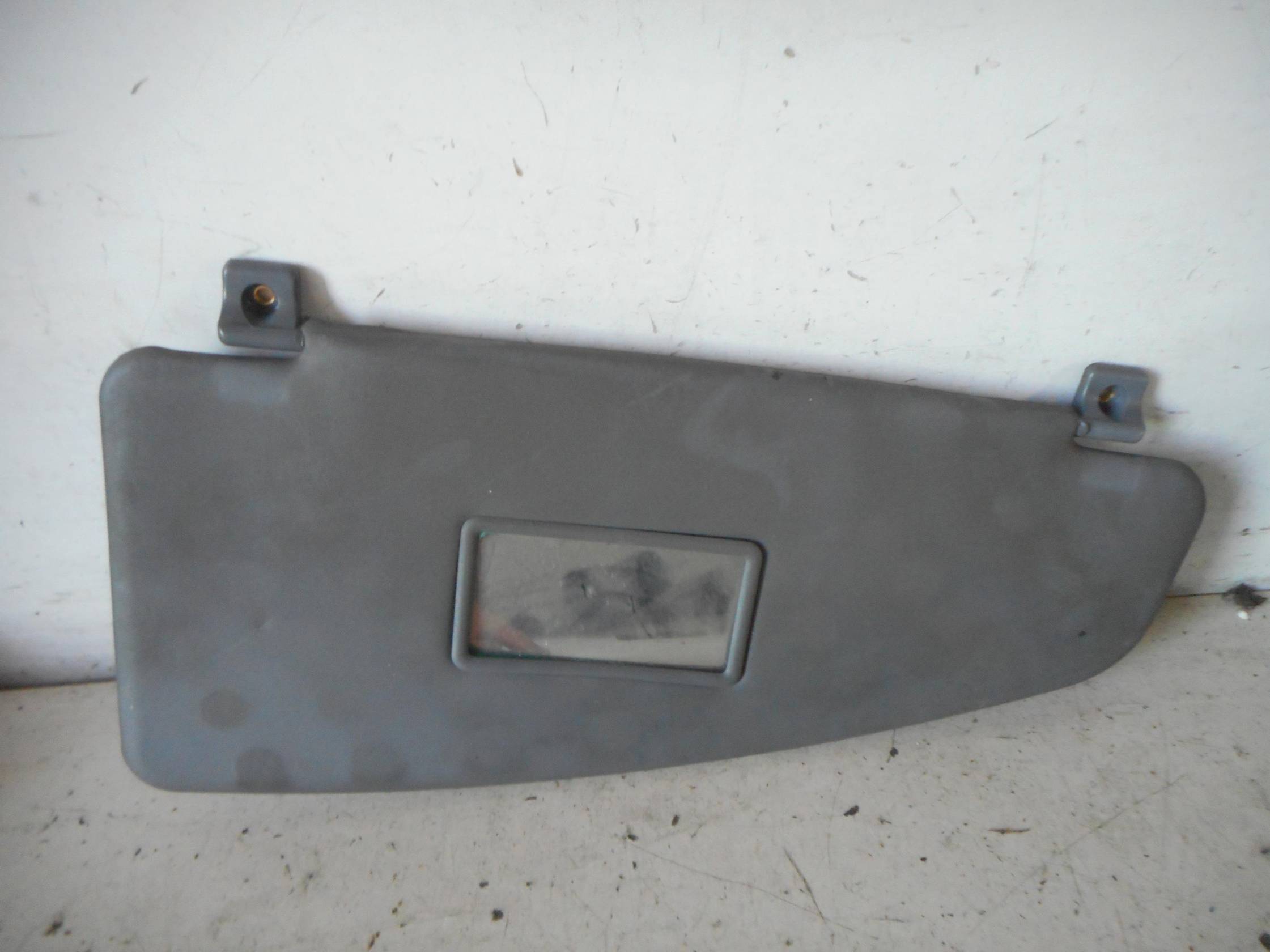 Aletta parasole parabrezza sx.